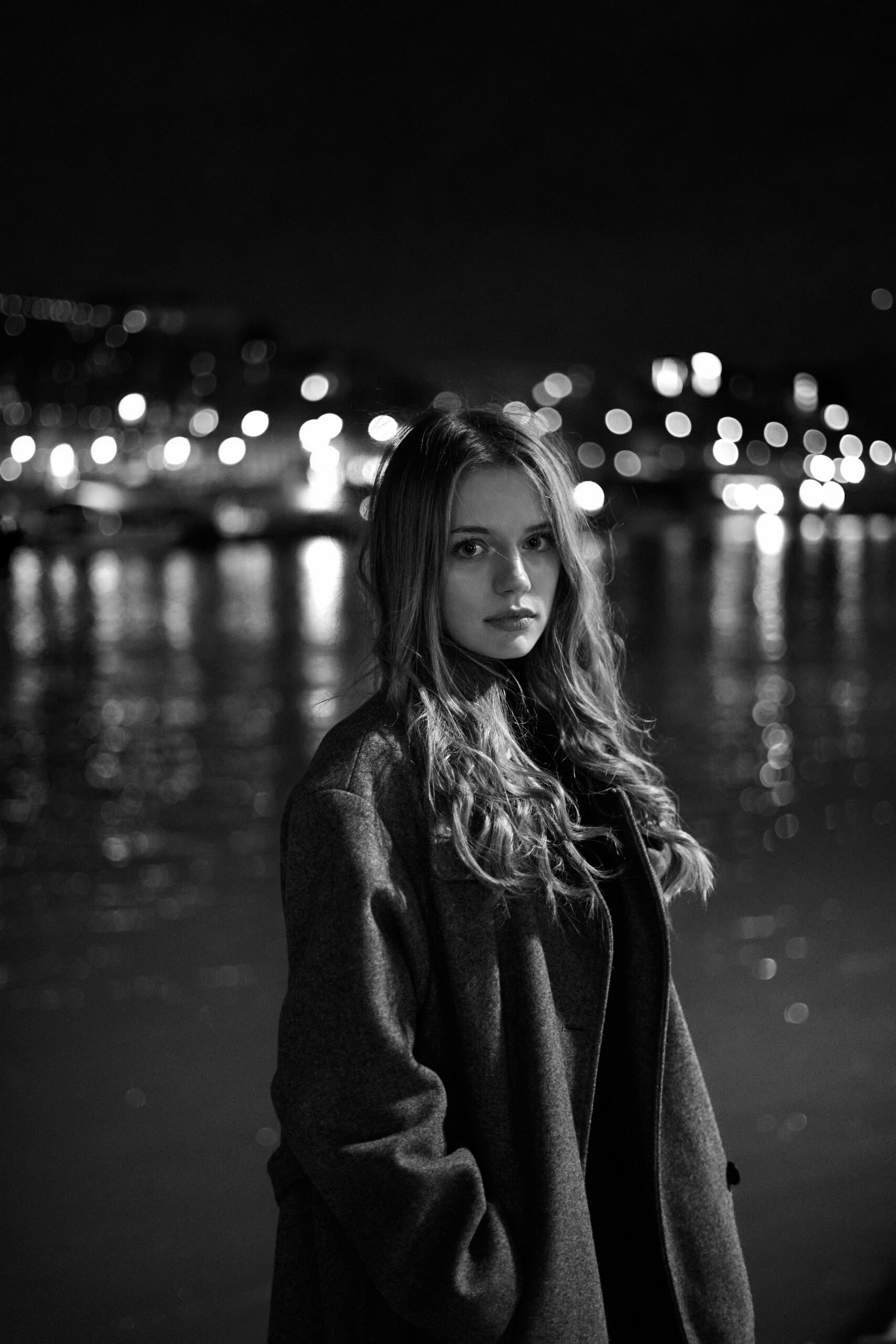 Night portrait by the river, black and white